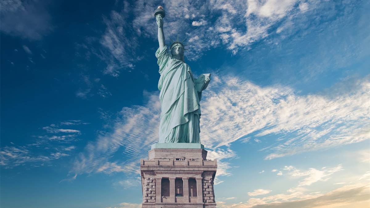 Blue Skies behind Statue of Liberty - NYC, New York, USA
